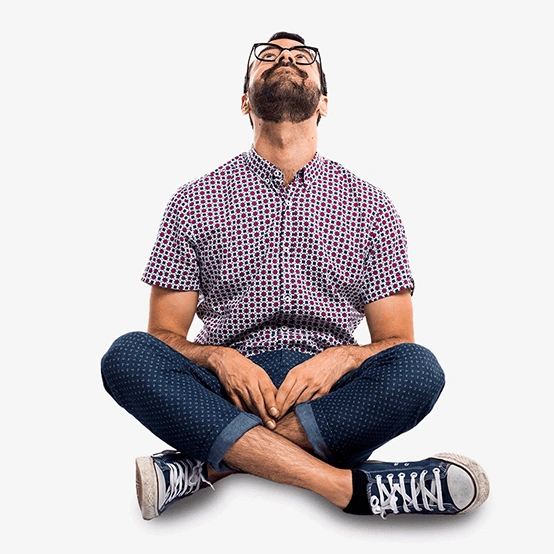 Man with glasses looking up