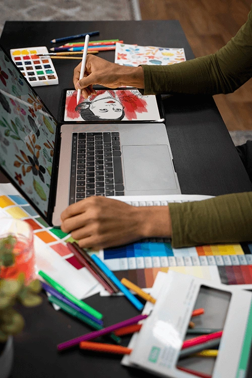Man drawing on a digital tablet